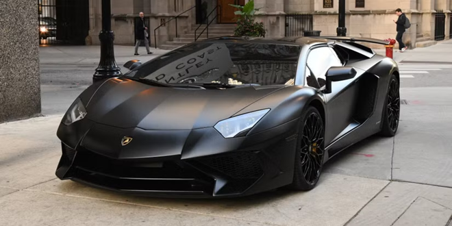 Kyrie Irving Lamborghini SV Roadster parked on the side of the street - Via bentleygoldcoast.com
